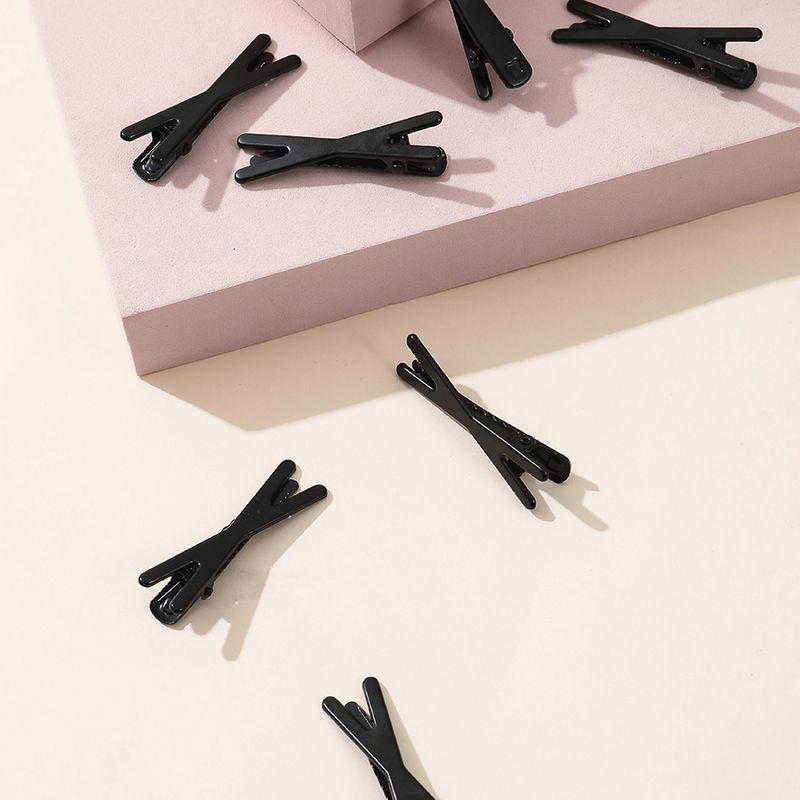 Paquete-de-broches-para-el-cabello-en-forma-de-x-de-goma-negro-4-5cm-10pzas-Miniso-2-5923