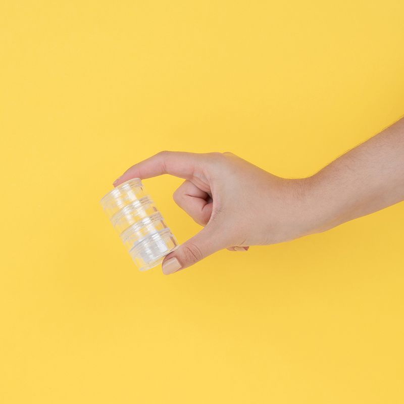 Frasco-para-viaje-de-cuatro-niveles-transparente-40g-Miniso-8-12908