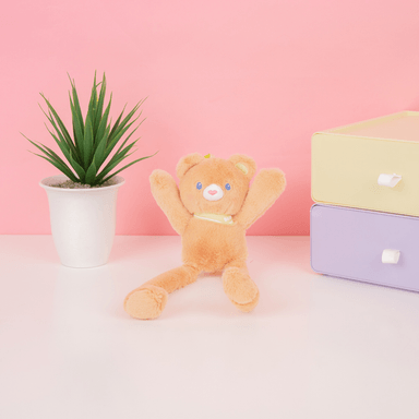 Llavero juguete colgante que tira de las orejas oso marrón de 30cm x 8cm -  Miniso