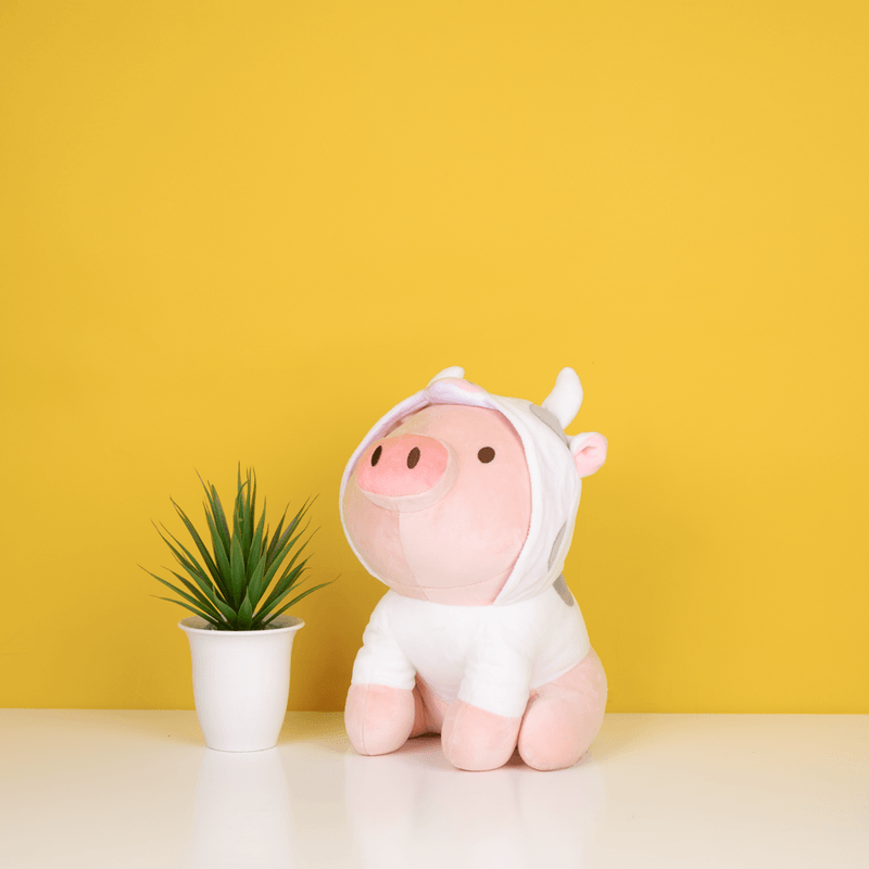 Peluche-de-cerdito-sentado-con-capucha-de-vaca-Miniso-2-4390