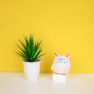 Peluche antiestrés serie penguin disfraz cerdito 8.2cm x 7cm x 11.5cm -  Miniso