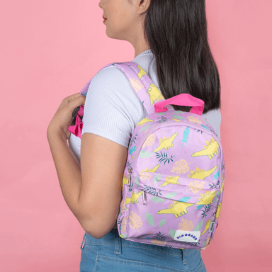 Mochila infantil miniso colección dinosaurios estampado mini lila -  Miniso