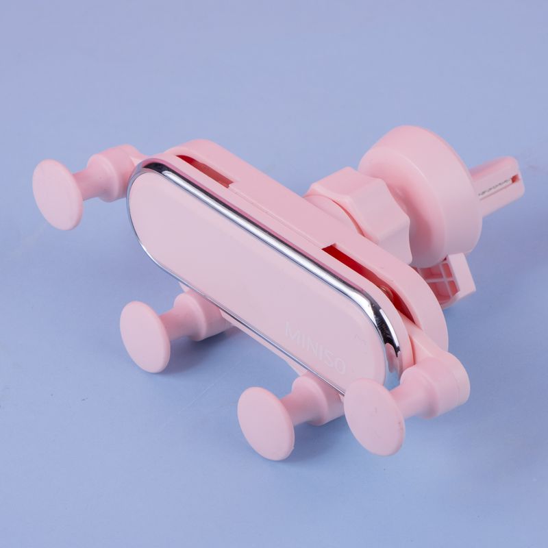 Soporte-de-celular-para-auto-gravedad-macaron-rosa-Miniso-3-21891
