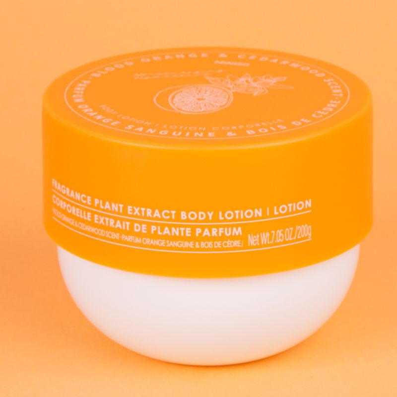 Loci-n-corporal-con-extracto-de-plantas-arom-ticas-aroma-a-naranja-roja-y-madera-de-cedro-Miniso-3-24978