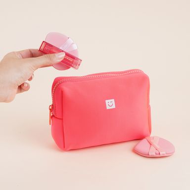 Cosmetiquera miniso tela tipo esponja coral -  Miniso