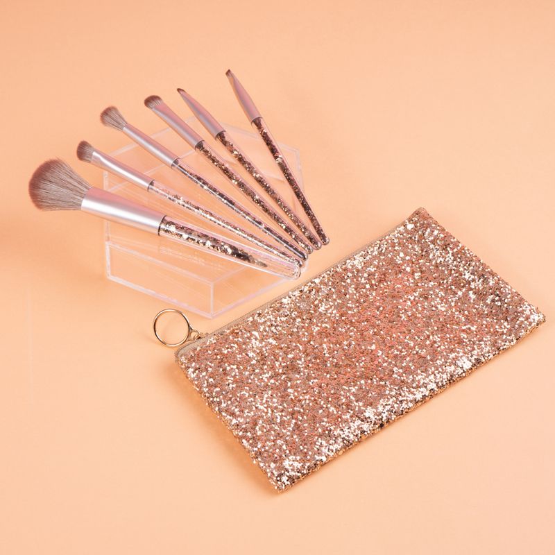 Brochas-de-maquillaje-con-bolsa-con-cremallera-6-piezas-doradas-Miniso-2-24257