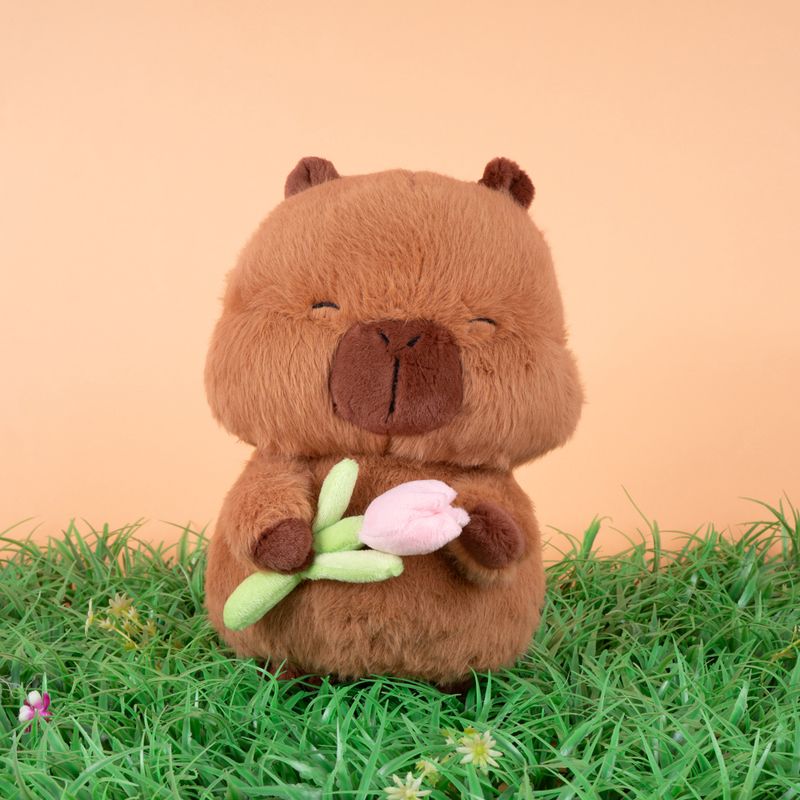 Peluche-con-flores-en-la-mano-serie-kapibala-Miniso-3-26835