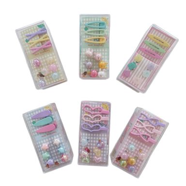 Set de accesorios para cabello estuche transparente conejitos colores pastel  -  Miniso