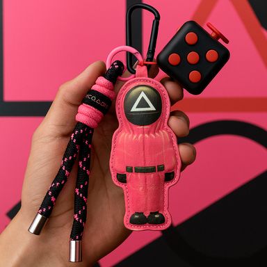 Colgante de juguete antiestrés de la colección squid game (negro y rosa) -  El juego del calamar