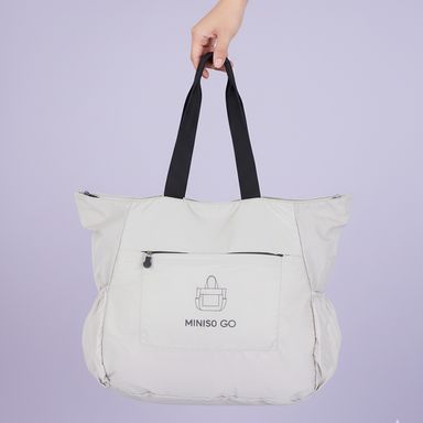 Organizador de viaje bolso plegable serie miniso go beige  -  Miniso