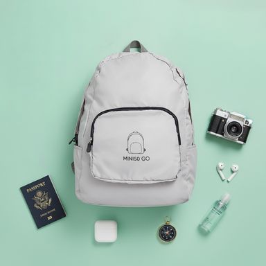 Organizador de viaje mochila plegable serie miniso go beige -  Miniso