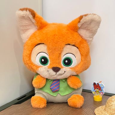 Peluche de 25 cm con postura sentada y traje nick serie zootopia -  Disney