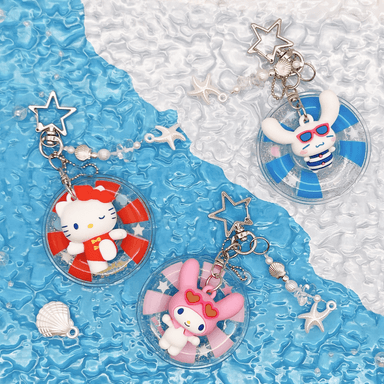 Llavero 3d de hello kitty y sus amigos jump in to summer sanrio con salvavidas transparente -  Sanrio Jump In To Summer